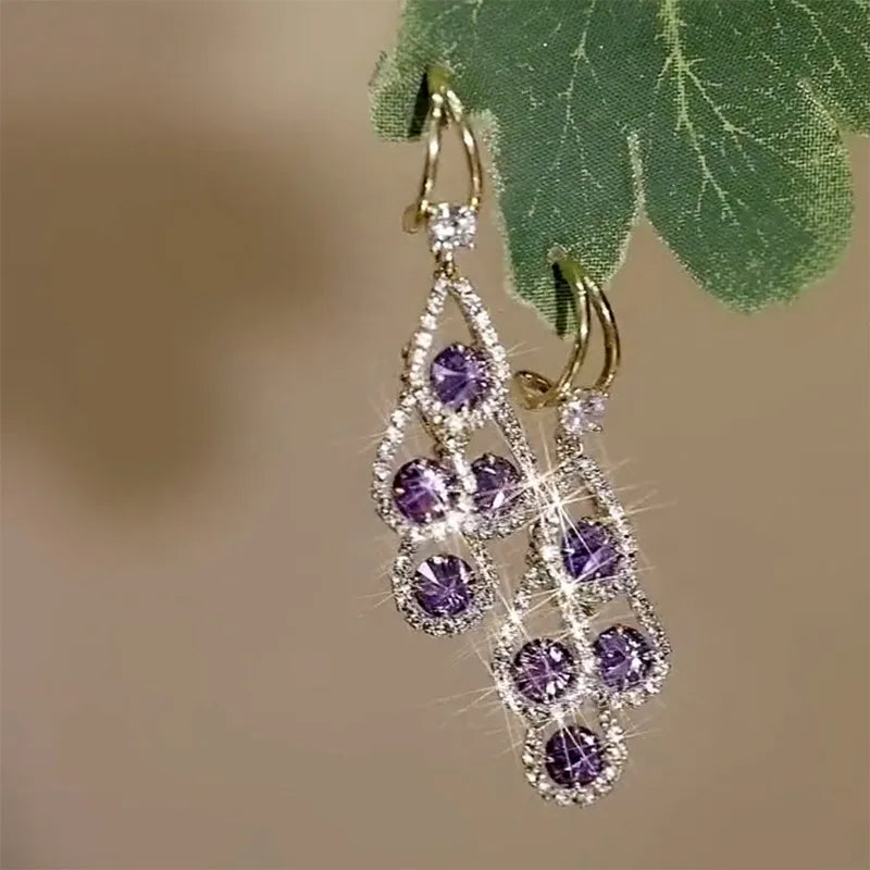 Boucles d'oreilles pendantes en cristal violet