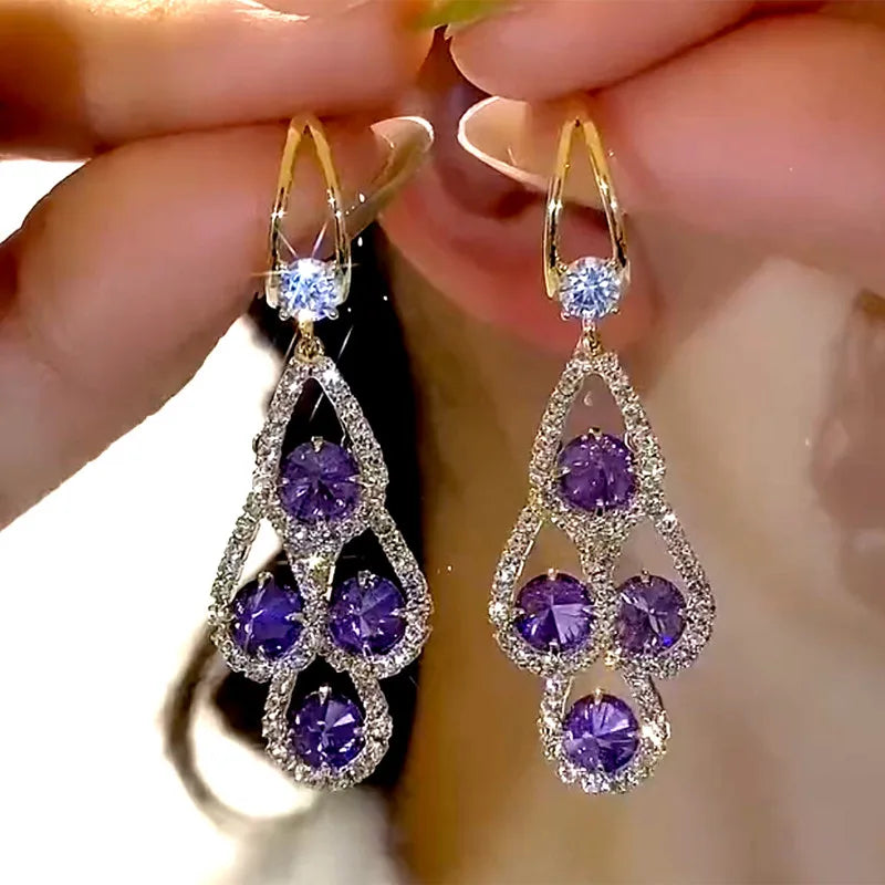 Boucles d'oreilles pendantes en cristal violet