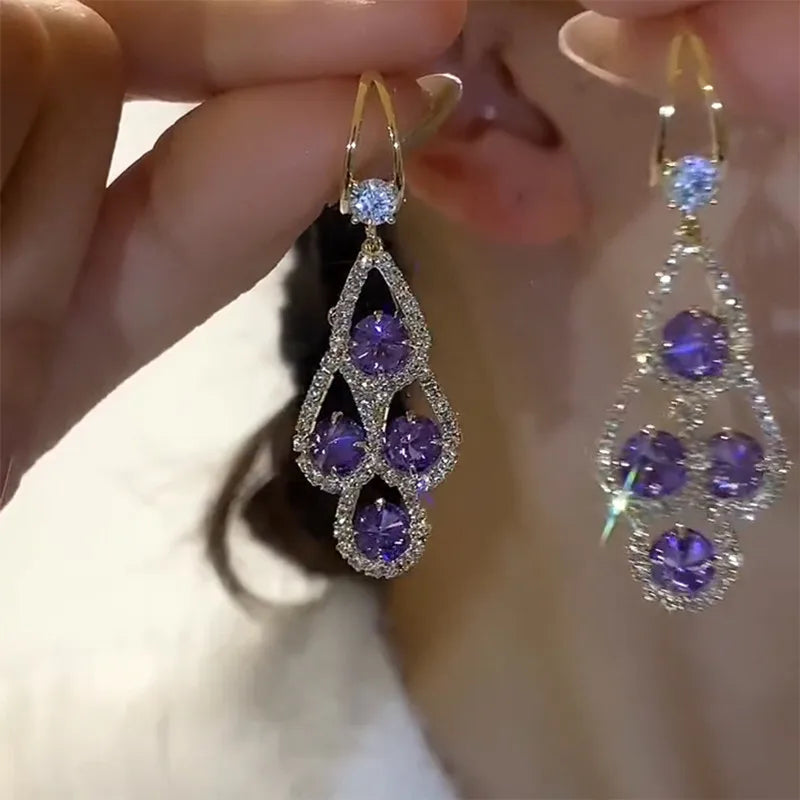 Boucles d'oreilles pendantes en cristal violet