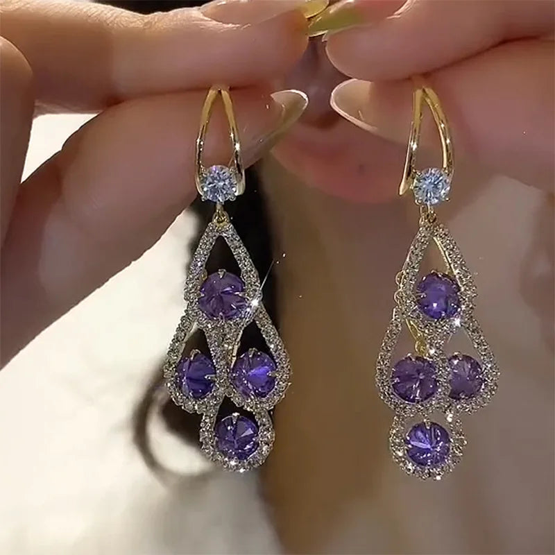 Boucles d'oreilles pendantes en cristal violet 